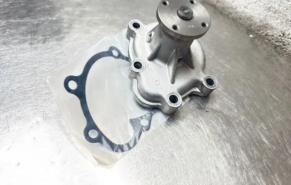 Opel Astra G Water pump 