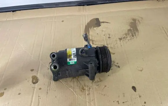 Opel Zafira B Air conditioning (A/C) compressor (pump) 13124752