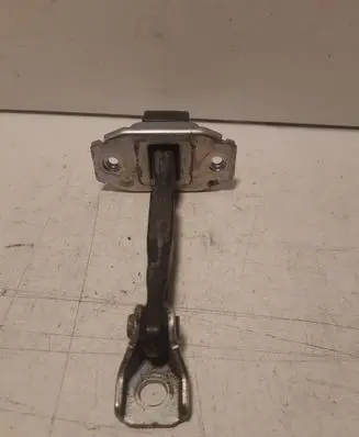 Front door check strap stopper