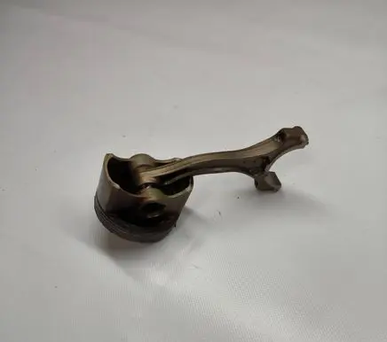 Piston with connecting rod