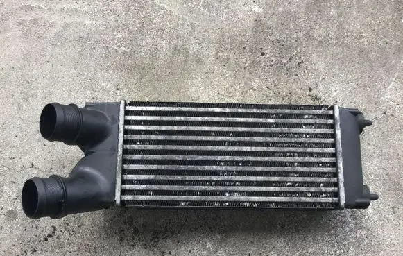 Peugeot Partner Intercooler radiator 9682434580