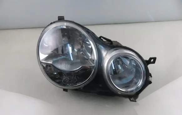 Volkswagen Polo IV 9N3 Headlight/headlamp 0301190202
