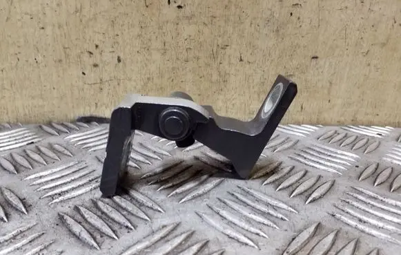 Rear door upper hinge