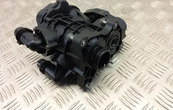 Thermostat/thermostat housing