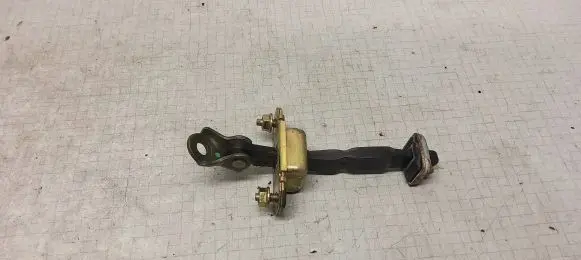 Subaru Legacy Front door check strap stopper