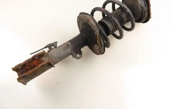 Toyota Corolla E120 E130 Front shock absorber with coil spring 