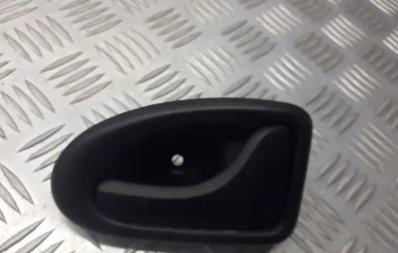 Dacia Logan I Rear door interior handle trim 7700830079