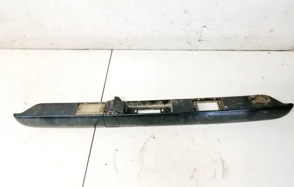 Trunk door license plate light bar
