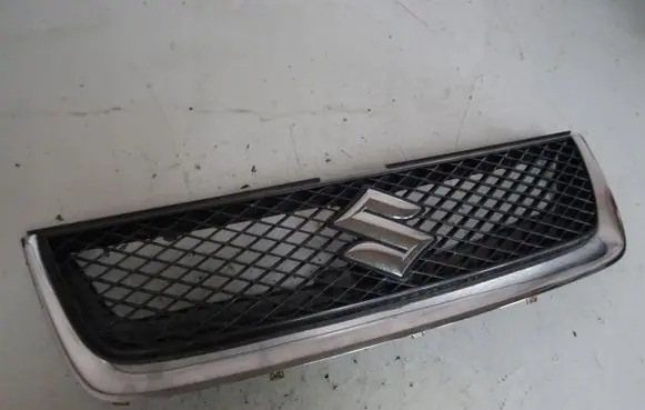 Suzuki Grand Vitara II Front bumper upper radiator grill 7174365J0