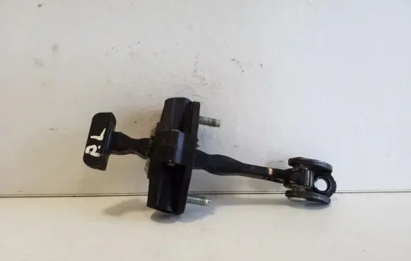 Front door check strap stopper