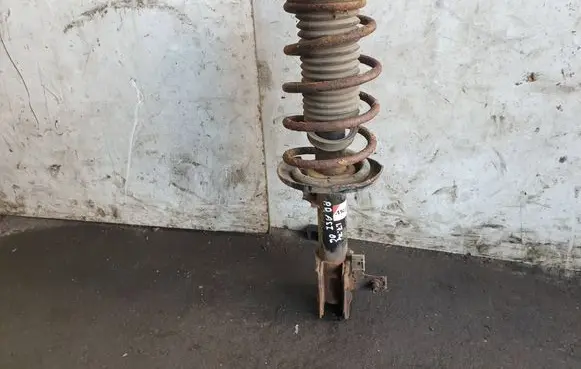 Opel Astra H Front shock absorber with coil spring