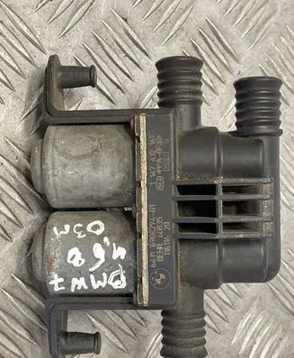 Coolant heater control valve