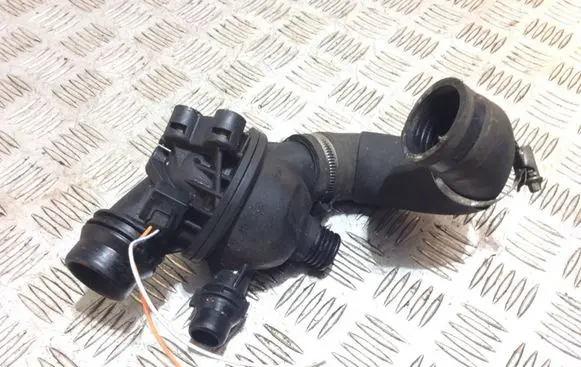 Thermostat/thermostat housing