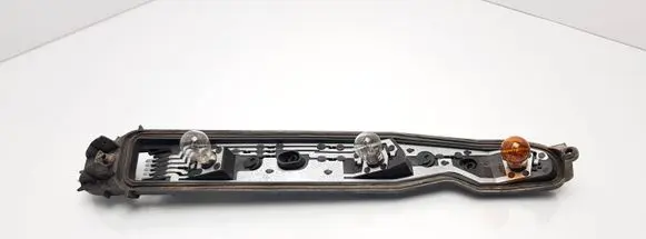 Opel Corsa C Tail light bulb cover holder