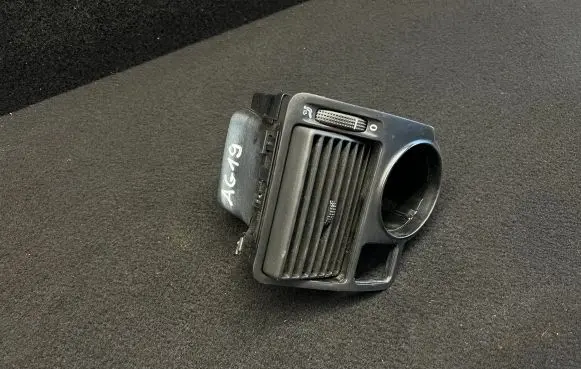 Volkswagen Golf IV Dash center air vent grill 1J1815715A