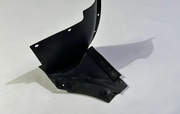 Front wheel arch liner splash guards