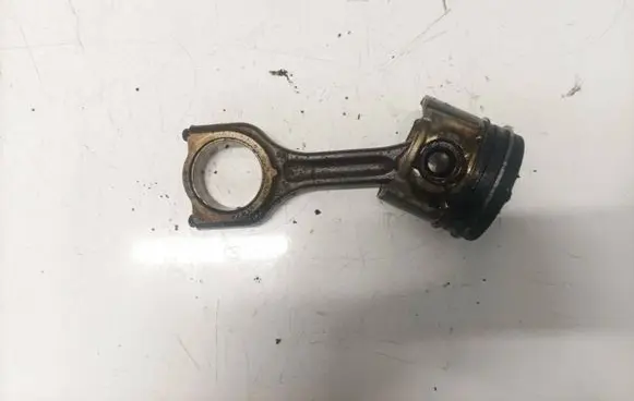 Piston with connecting rod