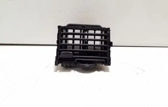 Nissan Leaf I (ZE0) Dash center air vent grill 687503NL0A