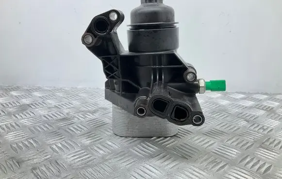 Volkswagen Golf Sportsvan Oil filter mounting bracket 03N115389B 03N117021