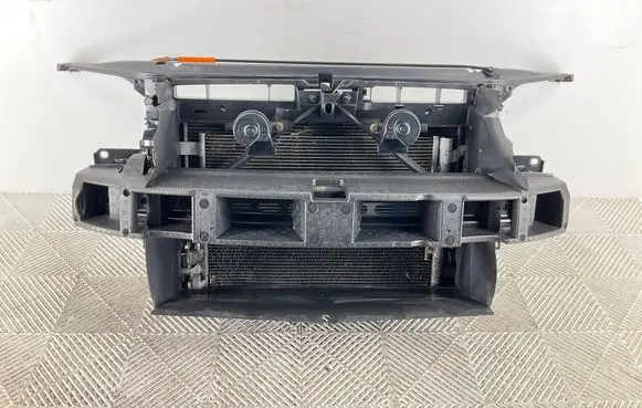 Radiator support slam panel