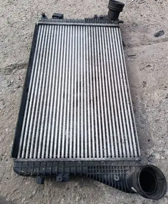 Volkswagen Golf V Intercooler radiator 1K0145803L