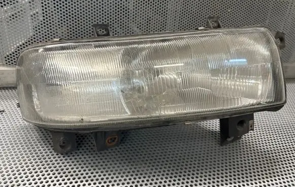 Renault Master II Headlight/headlamp 7700352104E