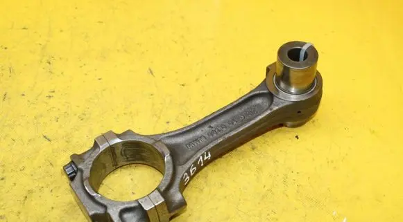 Piston with connecting rod