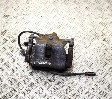 Volkswagen Golf VII Front brake caliper