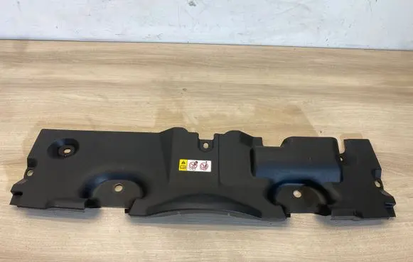 Engine bonnet/hood lock trim molding