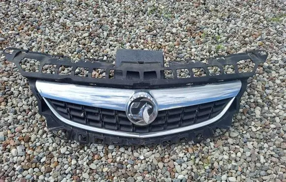 Opel Astra J Front bumper upper radiator grill 13266577