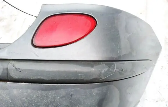 Rear bumper trim bar molding