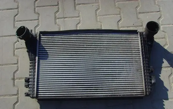 Volkswagen Golf V Intercooler radiator 1K0121345E