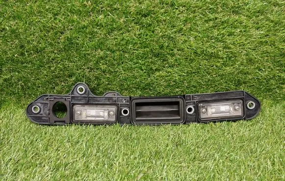 Volkswagen Jetta V Trunk door license plate light bar 1T0827574K