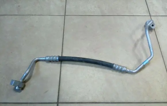 Ford Fiesta Air conditioning (A/C) pipe/hose C1B119A704AC NE65990