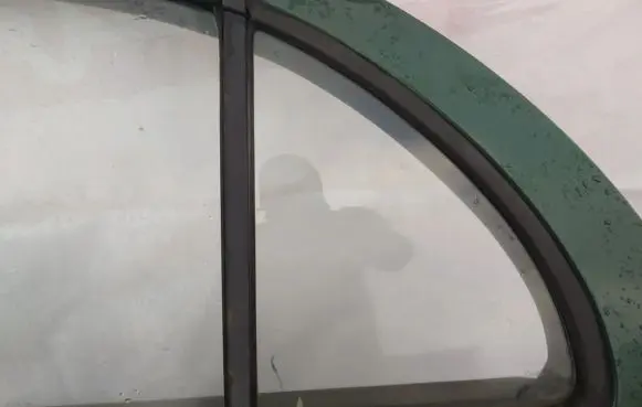 Nissan Almera Rear vent window glass 