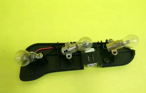 Mitsubishi Lancer Tail light bulb cover holder