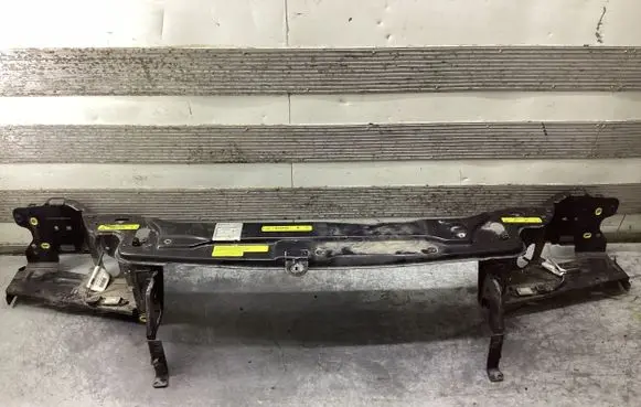 Radiator support slam panel bracket