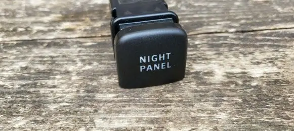 Panel lighting control switch