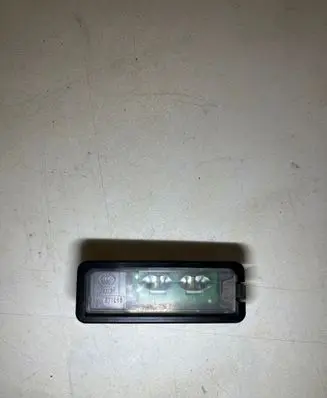 Volkswagen PASSAT CC Number plate light 1K8943021C
