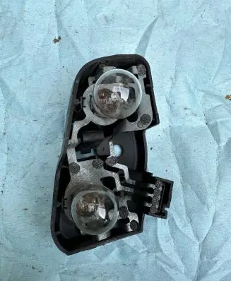 BMW 3 E46 Tail light bulb cover holder 6907938 060067