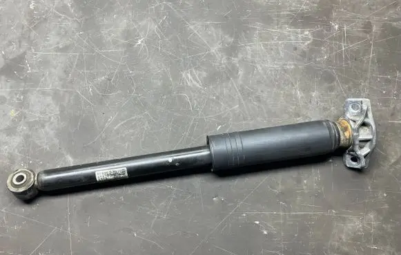 Opel Astra J Rear shock absorber/damper 13412743