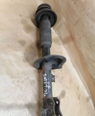 Suzuki Swift I Front shock absorber/damper 4160162J11
