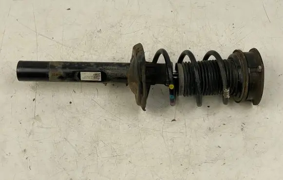 Seat Leon (5F) Front shock absorber with coil spring 5Q0413023FM