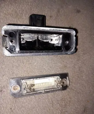 Volkswagen Golf IV Number plate light 1J6943021B