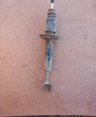Volkswagen PASSAT B5 Front shock absorber/damper 8D0412103B