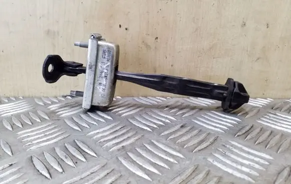 Opel Astra J Rear door check strap stopper 13270612