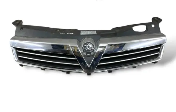 Opel Astra H Front bumper upper radiator grill 13225788 13225789