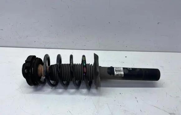 Volkswagen PASSAT B8 USA Front shock absorber/damper 564413031K