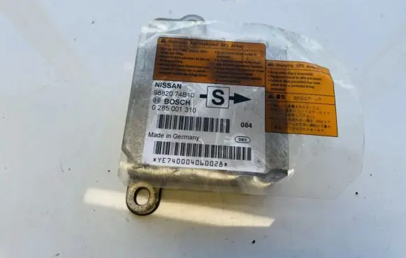 Nissan Micra Airbag control unit/module 9882074b10 0285001310