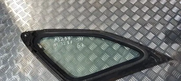 Mazda 323 F Rear vent window glass E643R005834 E643R-005834